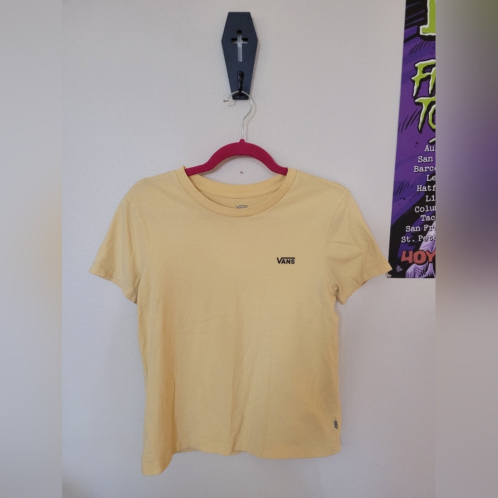 Vans Womens Size M t-shirt. Small hole underneath design on back as pictured